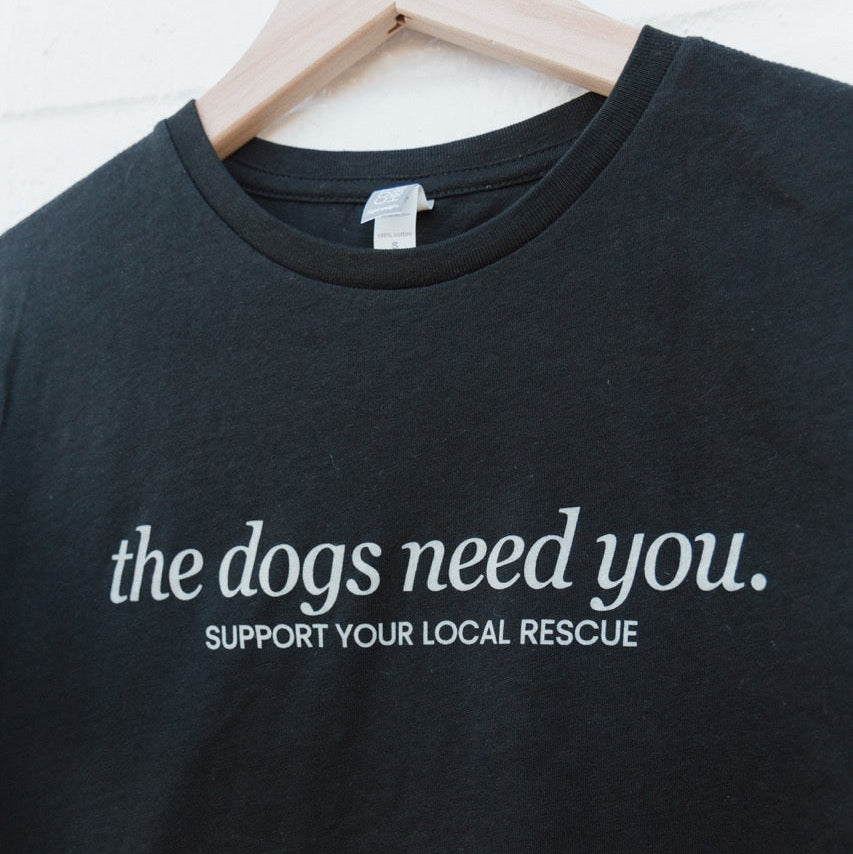 The Dogs Need You Tee